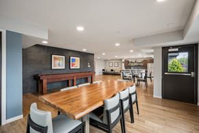Buffalo apartment for rent - Clubroom with Shuffleboard at Alo Apartments in Buffalo MN
