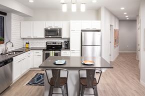 Des Moines apartment for rent - Kitchen at Confluence on 3rd Apartments in Downtown Des Moines