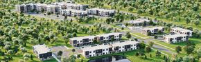 Charlotte apartment for rent - A bird's eye view of a residential area with multiple buildings and greenery.