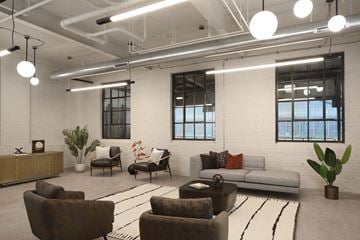Milwaukee apartment for rent - a living room with couches and chairs and a rug