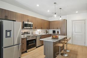 Wylie apartment for rent - Virtually Staged Kitchen at Meridian at Wylie in Wylie, TX.