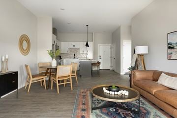 Apple Valley apartment for rent - a living room and dining room with a couch and a table