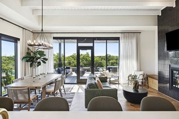 St. Louis Park apartment for rent - A modern living room with a dining table and chairs.
