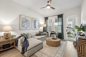 Port Charlotte apartment for rent - Spacious Living Area with Wood Style Flooring at Marisol Apartments in Port Charlotte FL