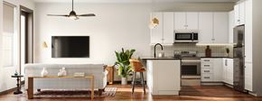 Naples apartment for rent - The kitchen and living area at The Karlyn of Naples in Naples, Florida.