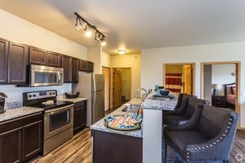Wooden cabinets with rich cherry wood finish