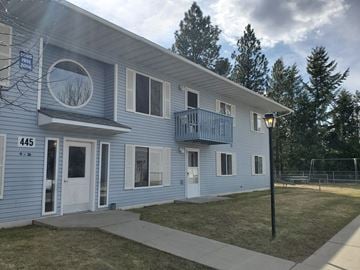 Bonners Ferry apartment for rent - a blue house with a porch on the side of it