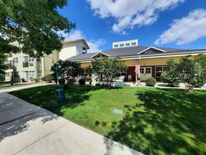 Missoula apartment for rent - a large building with a lawn in front of it
