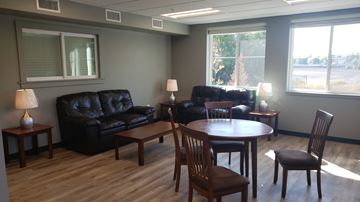 Whitefish apartment for rent - an image of a living room with couches and a table
