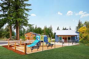Mill City apartment for rent - a playground with a swing set and a pavilion