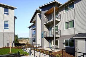 Stayton apartment for rent - a view of a building with stairs in front of it