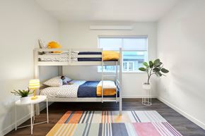Stayton apartment for rent - a bedroom with a bunk bed and a window