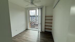 Hillsboro apartment for rent - A room with a sliding glass door leading to a balcony.