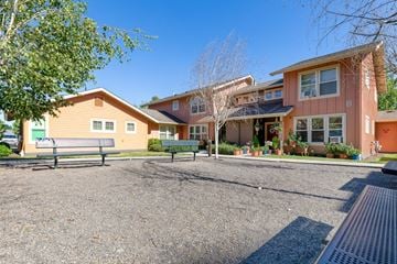 Forest Grove apartment for rent - a park bench in front of a house
