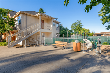 Forest Grove apartment for rent - a playground in front of a house with a slide