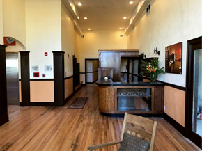 Astoria apartment for rent - A wooden chair is in front of a wooden table.
