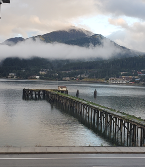 Douglas apartment for rent - a dock on the water with a mountain in the background