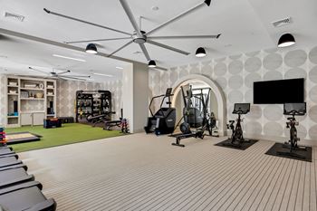 The gym at the flats at big tex apartments
