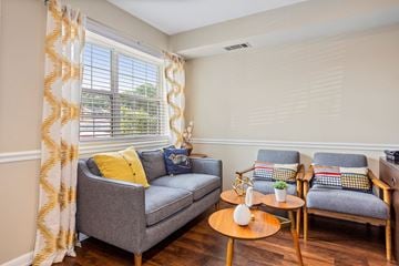 Alexandria apartment for rent - a living room with two couches and chairs and a window