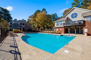 Cary apartment for rent - A large swimming pool in front of a house with a deck at Brampton Moors, Cary, NC, 27513