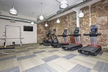 The gym at the district flats apartments in lenexa
