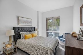 Alexandria apartment for rent - A bedroom with a large bed and a balconyat Lincoln Old Town, Alexandria, VA 22314