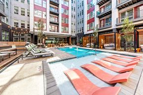 Charlotte apartment for rent - a swimming pool in the middle of an apartment building at South and Hollis, Charlotte, NC, 28209