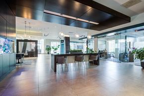 Washington apartment for rent - A modern dining area with a long table and chairs.