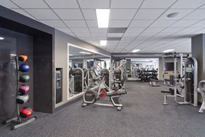 Washington apartment for rent - a fitness center with exercise equipment in a building at Fort Totten Square, Washington DC, 20011