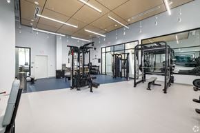 Washington apartment for rent - A spacious gym with a variety of equipment at Jayde Parkside, District of Columbia, 20019
