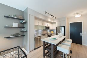 Washington apartment for rent - A modern kitchen with a dining table at Dock 79, Washington, District of Columbia