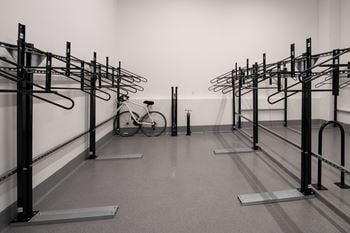 A bicycle is parked in a bike rack