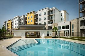 Bowie apartment for rent - take a dip in our resort style swimming pool  at Woodmore Grand, Bowie, 20721