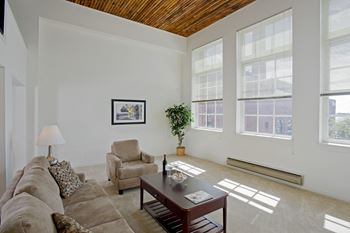 A living room with a couch and a coffee table