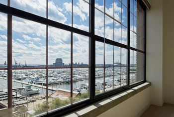 A view of the harbor from a window in a building