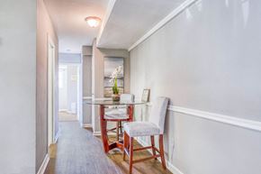 Washington apartment for rent - A dining room with a table and chairs at Huntwood Courts Apartments, Washington, DC