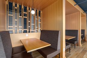 Washington apartment for rent - a dining room with wooden walls and a table and chairs