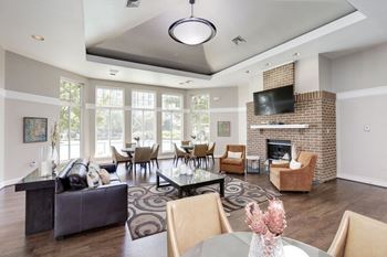 Clubroom with tv and fireplace
