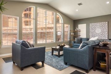 Albuquerque apartment for rent - A living room with two grey couches and a coffee table.
