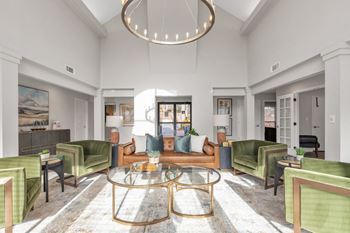 A living room with couches and chairs