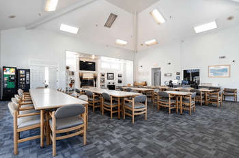 Clubhouse with big screen tv, and library