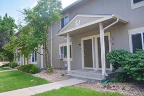 Fort Collins apartment for rent - the front of a house with steps and a porch