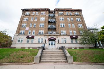 New Haven apartment for rent - A large building with a fire escape on the side.