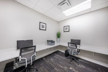 Resident business center with computer and printer