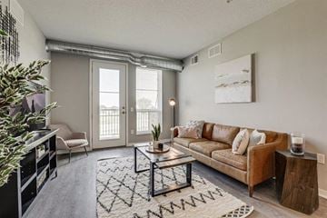 Burnsville multi-family for rent - a living room with a couch and a coffee table