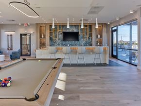 Hackensack apartment for rent - Recreational lounge area with a pool table and communal space at Ora luxury apartments in Hackensack, NJ
