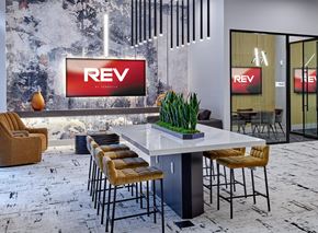 Belleville apartment for rent - A modern dining area with a white table and chairs.