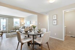 Kelowna apartment for rent - A dining room with a table and chairs.