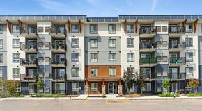 Calgary apartment for rent - large modern apartment building with parking out front