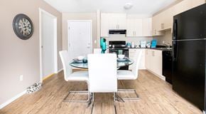 North Cowichan apartment for rent - A kitchen with light cabinets and black appliances